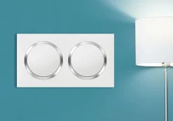Legrand Plaque de finition 2 postes Dooxie 6 008 42 coloris blanc mat avec bague effet chrome l.158 x P.10 x H.87 mm
